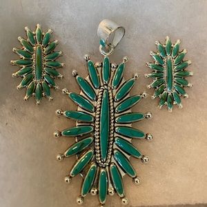 Jade colored matching earrings and pendant